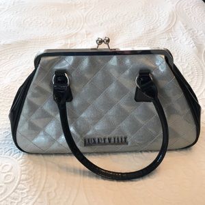 Lux de Ville kiss closure shoulder bag
